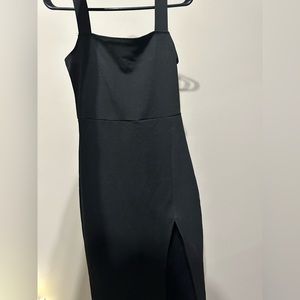 Black tight dress with slit on left side size small